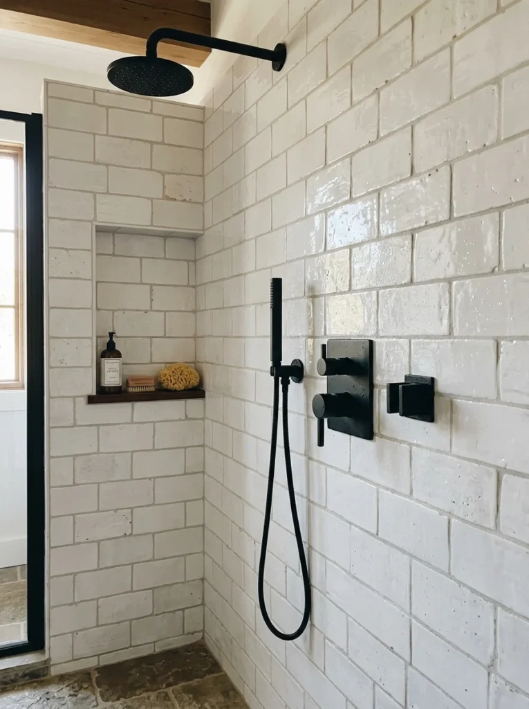 Handmade textured subway tile creating timeless farmhouse bathroom style.